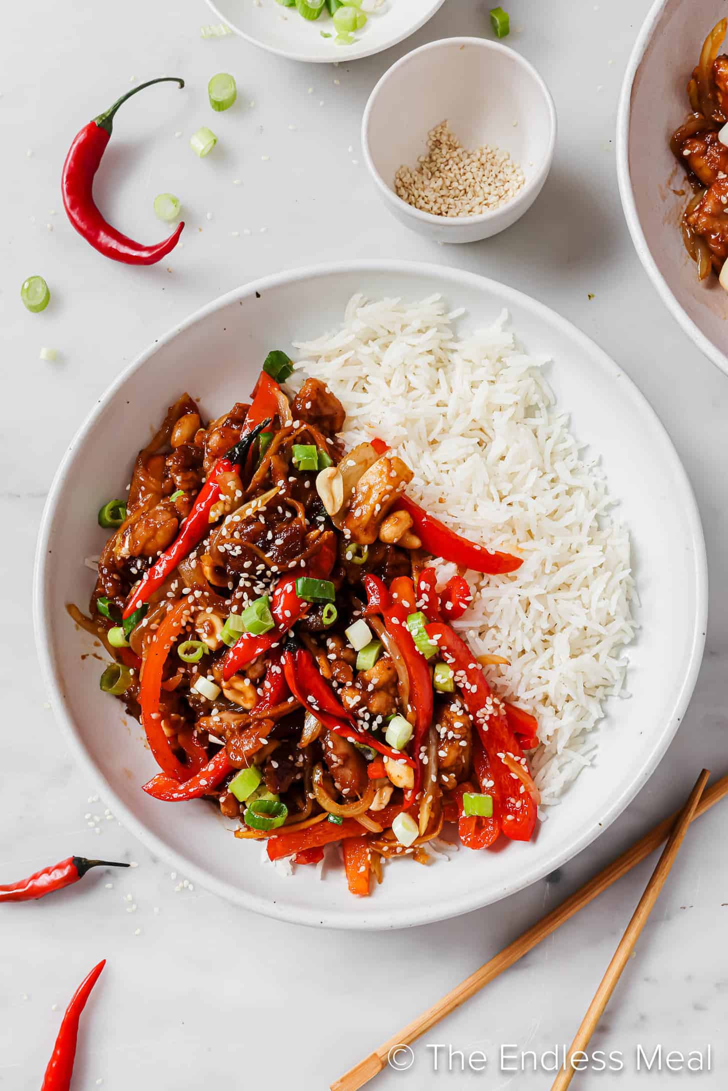 Spicy Kung Pao Chicken on a bowl on the dinner table. 