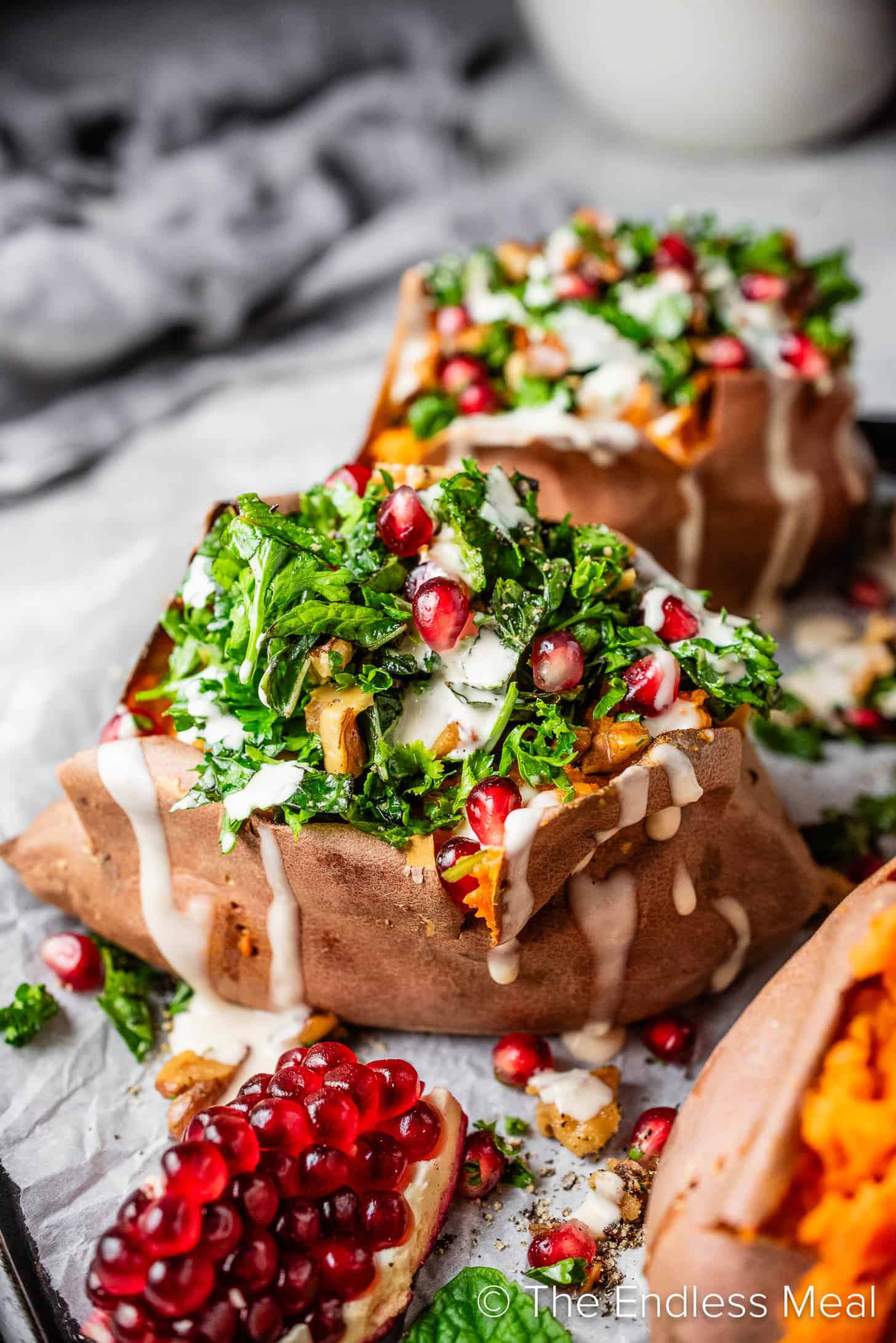 A baked Sweet Potato with Pomegranate and mint