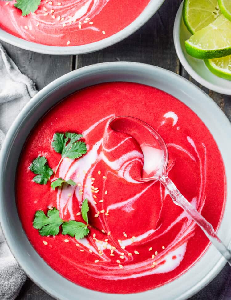 A bowl of Thai Beet Soup with a spoon
