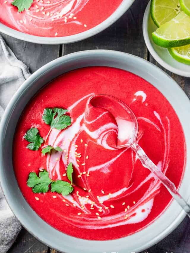 A bowl of Thai Beet Soup with a spoon