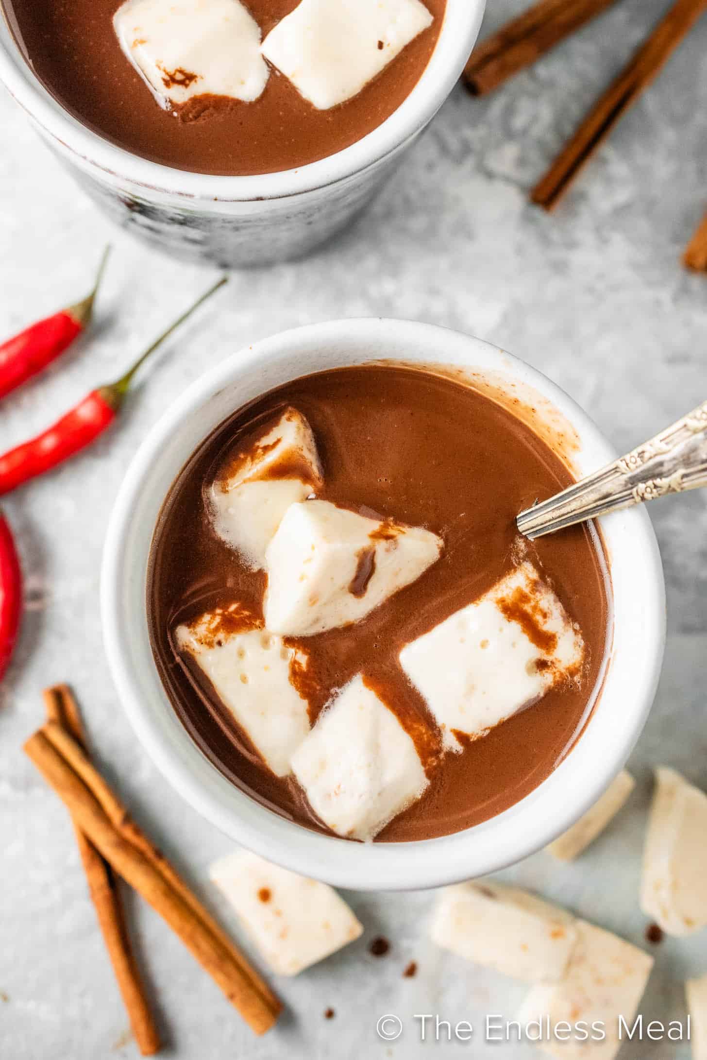 Looking down on a mug of Mexican Spicy Hot Chocolate with marshmallows