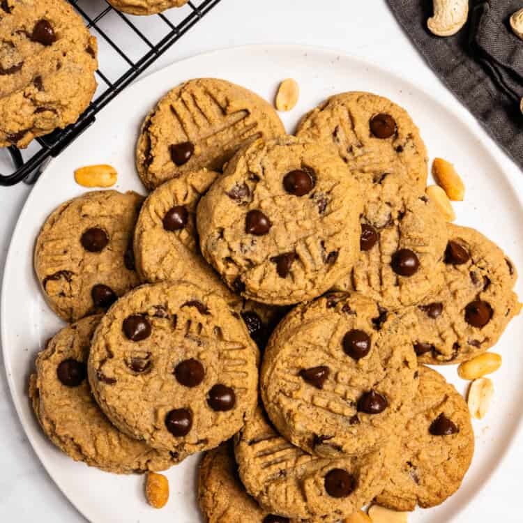 Whole Wheat Peanut Butter Cookies piled on a dessert plate