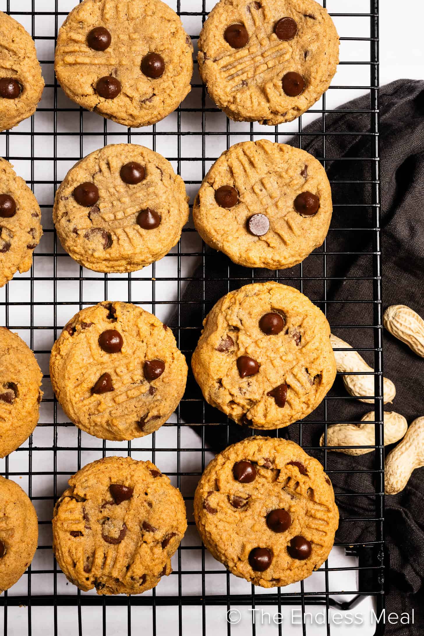 Whole Wheat Peanut Butter Cookies on a wire rack