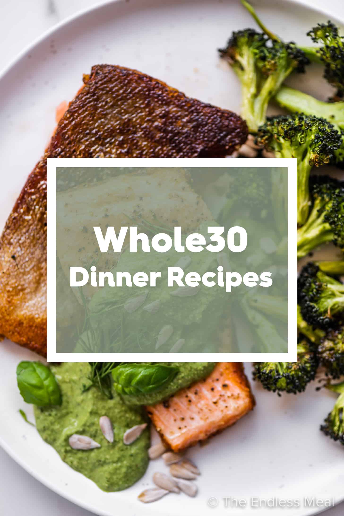 A dinner plate with salmon and broccoli with the words Whole30 Dinner Recipes on top.