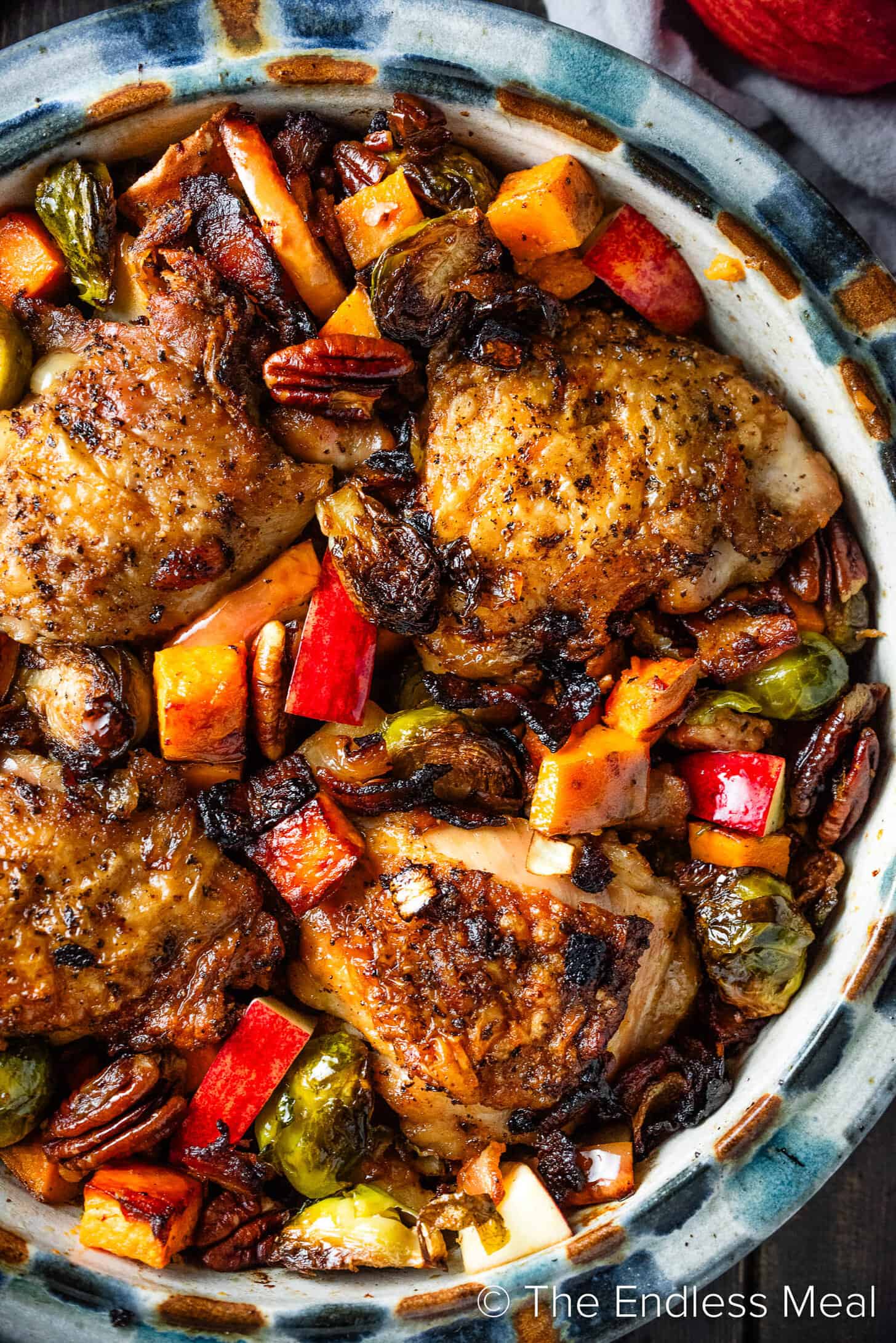 Chicken with Brussels Sprouts and Sweet Potatoes in a baking dish