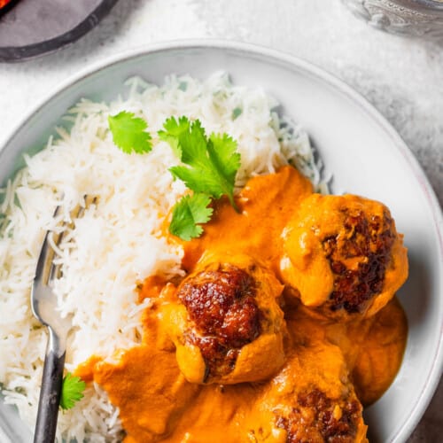 Indian Meatball Curry and rice on a dinner plate