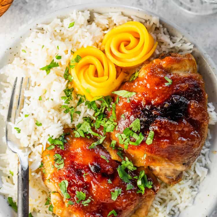 Mango Chutney Chicken in a bowl with rice on the dinner table