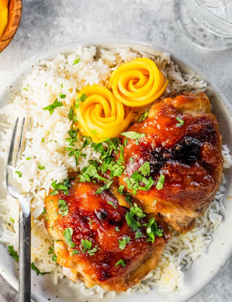 Mango Chutney Chicken in a bowl with rice on the dinner table