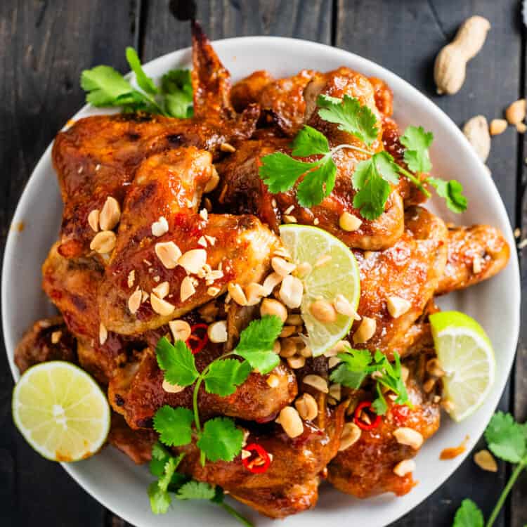 Thai Chicken Wings piled high on an appetizer platter