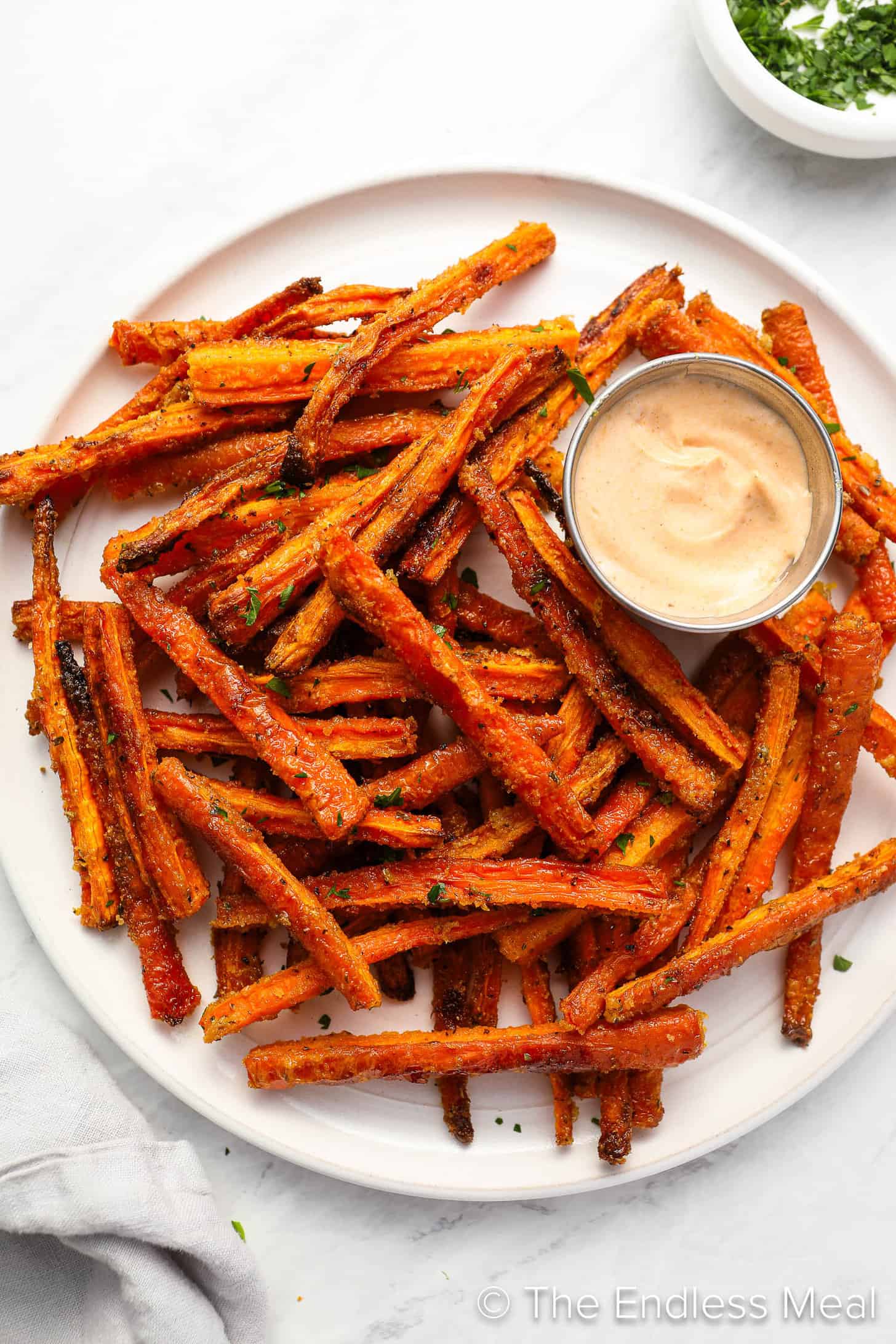 Carrot Fries on a serving plate with dip