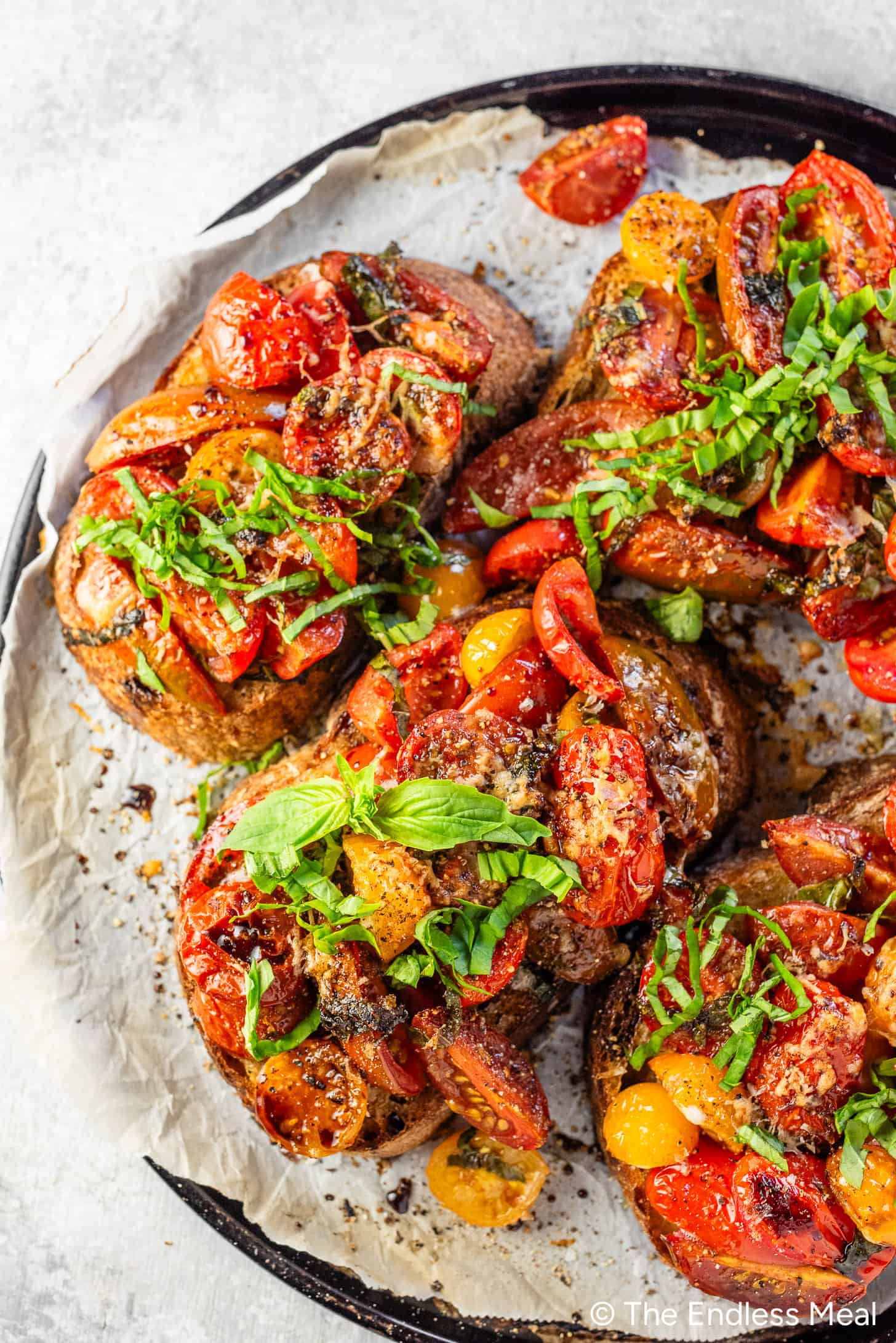 This Bruschetta Dinner hot out of the oven on a baking sheet