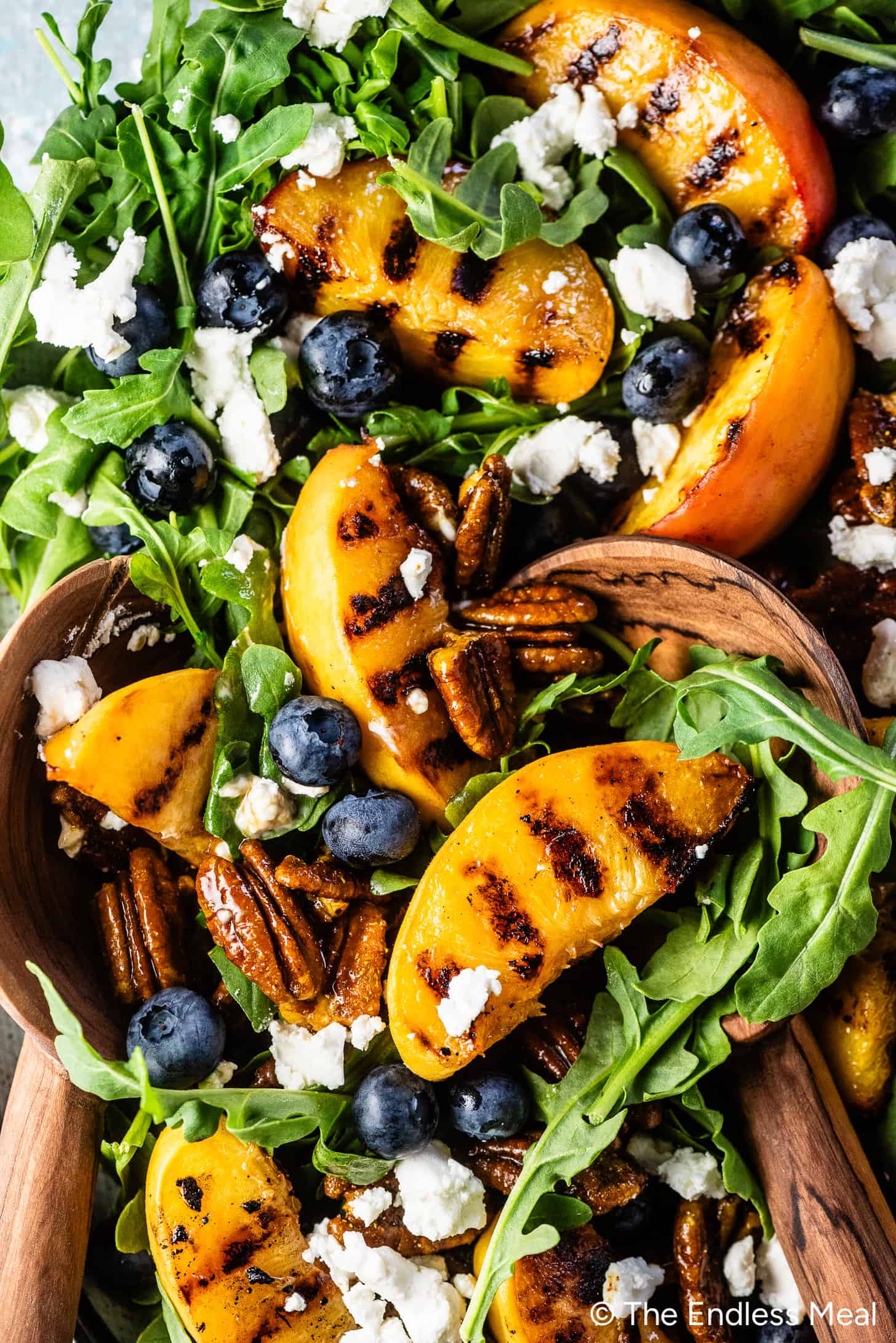 Grilled Peach Salad in a salad bowl