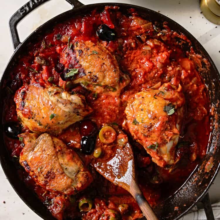 Italian Braised Chicken in a pan on the dinner table