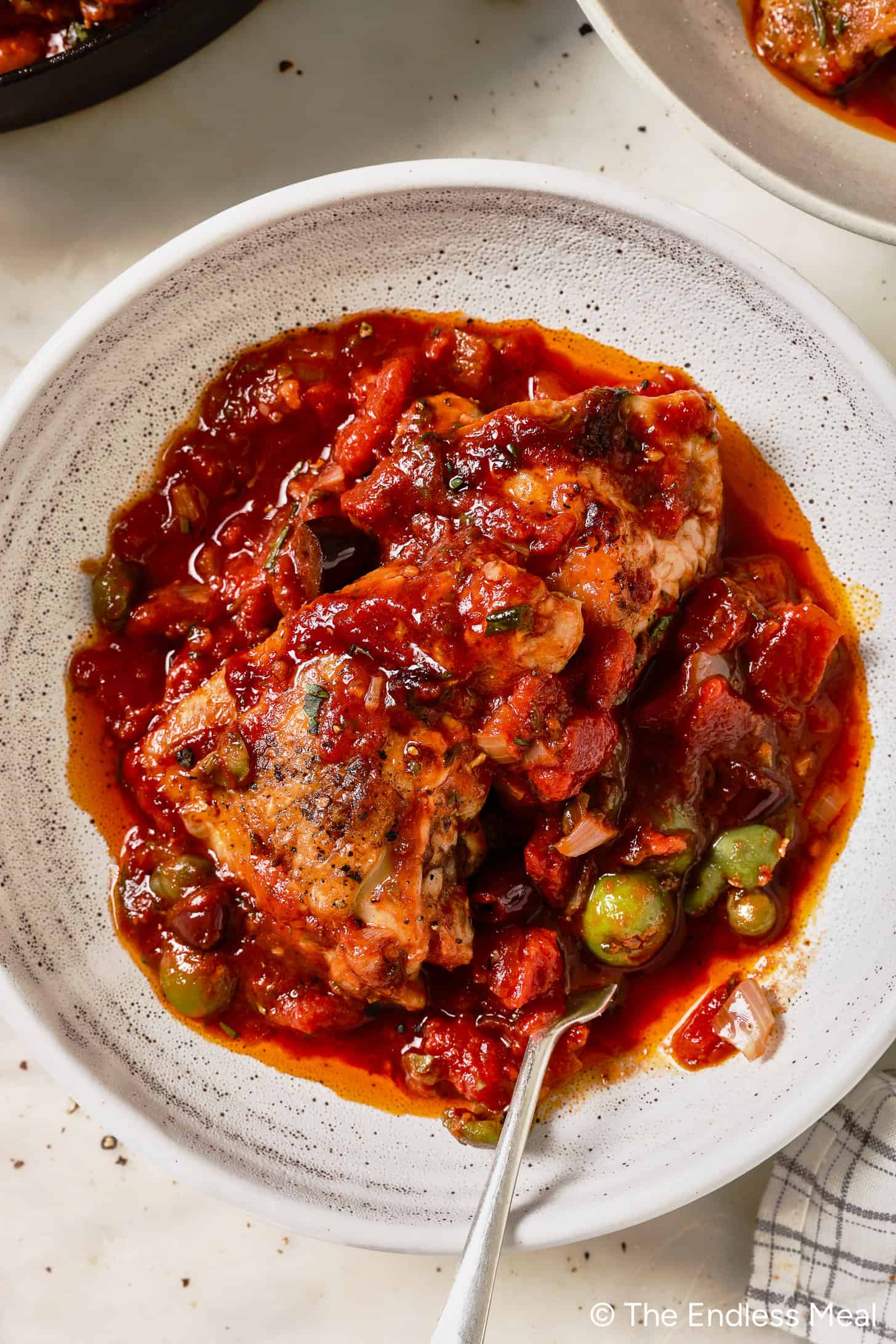 Italian Braised Chicken on a dinner plate