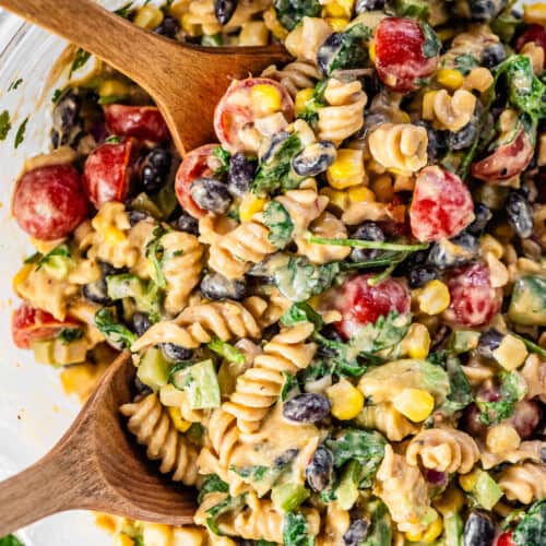Making Mexican Pasta Salad in a salad bowl