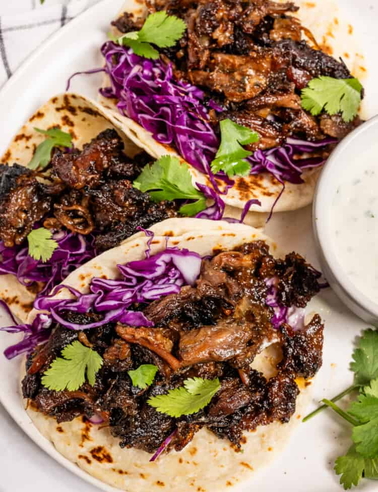Oxtail Tacos on a dinner plate