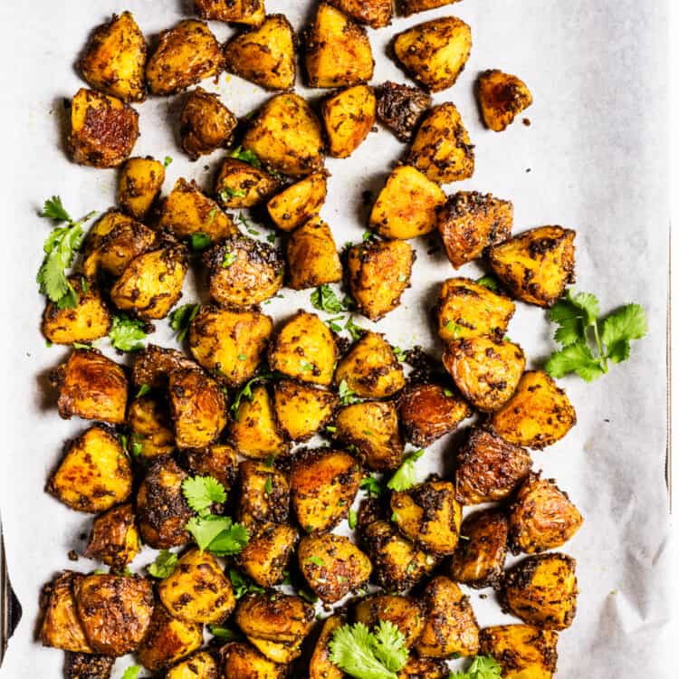 Bombay Potatoes with cilantro on a pan