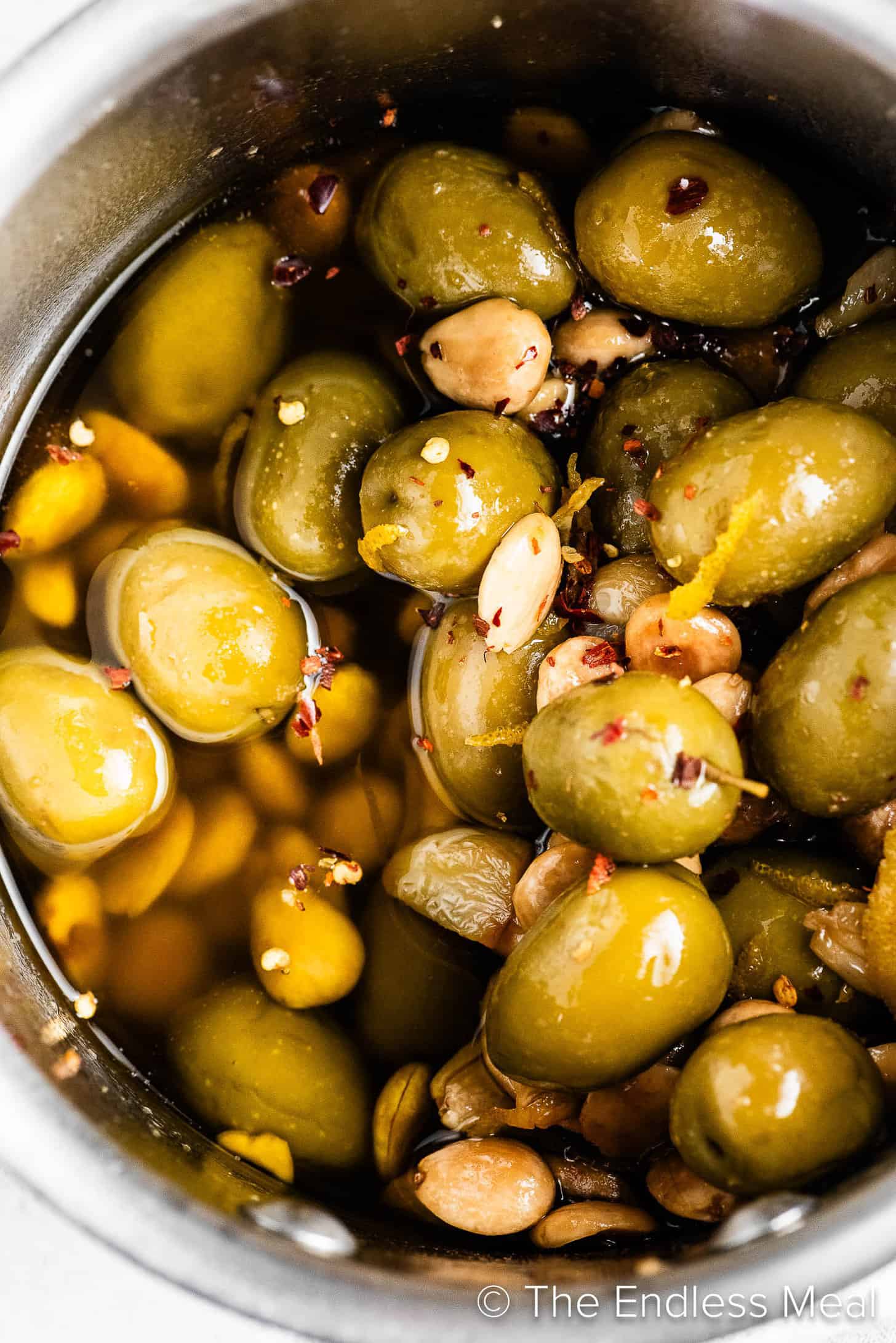 Making Marinated Olives in a pot