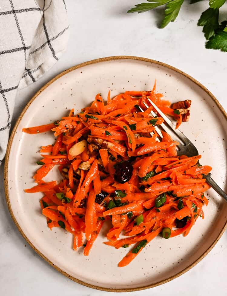 Raw Carrot Salad on a dinner plate