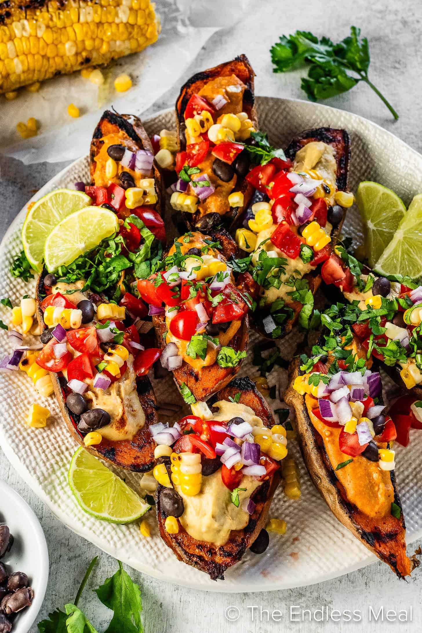 Southwest Stuffed Sweet Potatoes on a platter on the dinner table